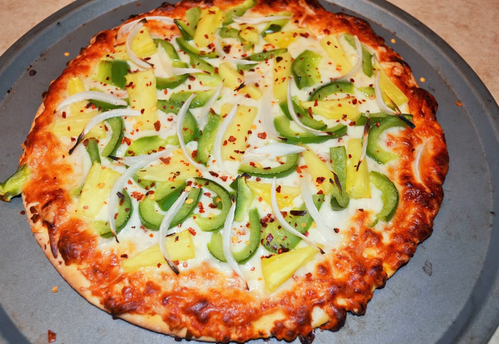 Pineapple toppings on pizza