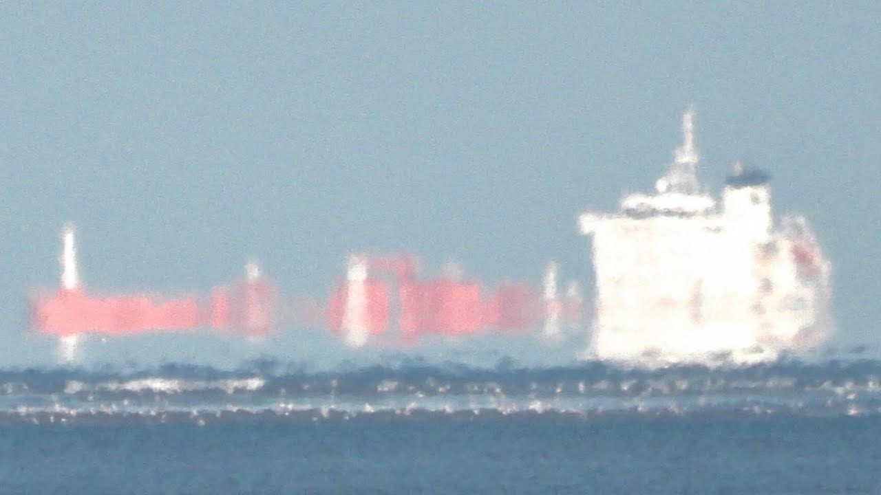 Ship disappearing over horizon