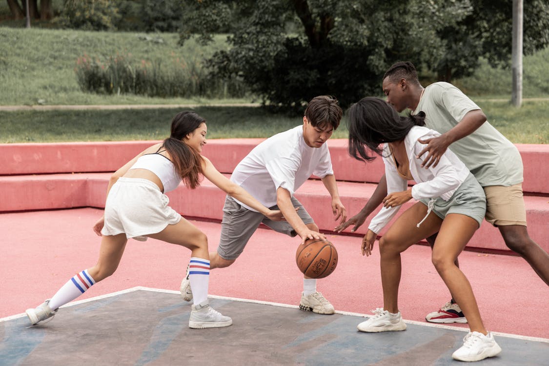 group teens park basketball