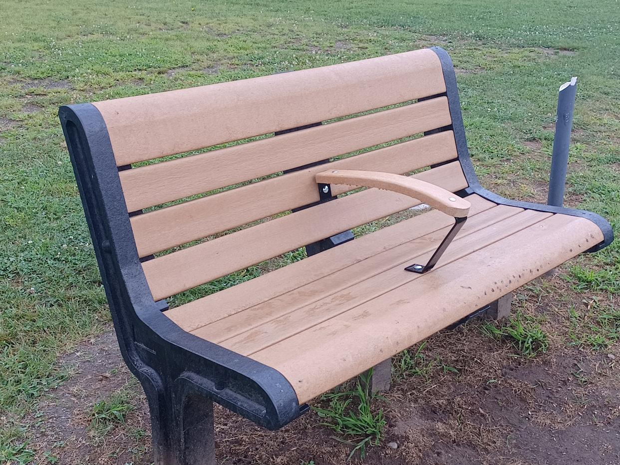 park benches armrests hostile