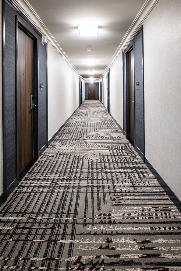 busy hotel corridor carpet