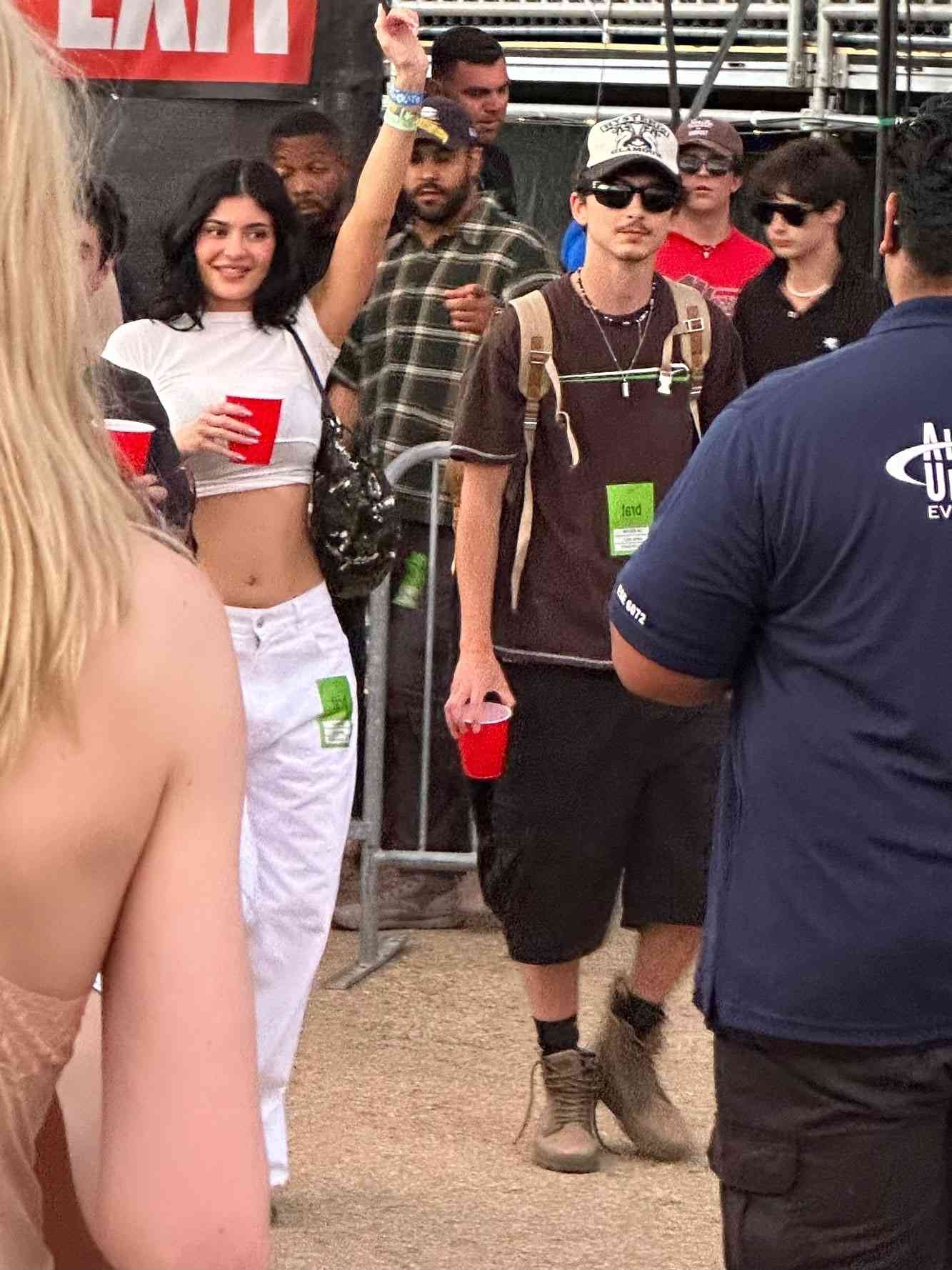 Timothée Chalamet walking with Kylie Jenner